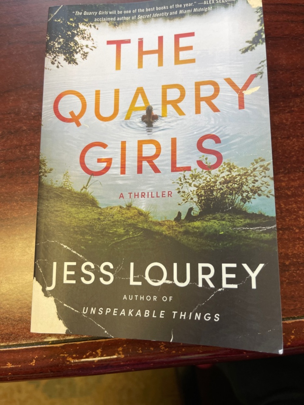 The Quarry Girls by Jess Lourey - Paperback Thriller in Blue, Green, Orange